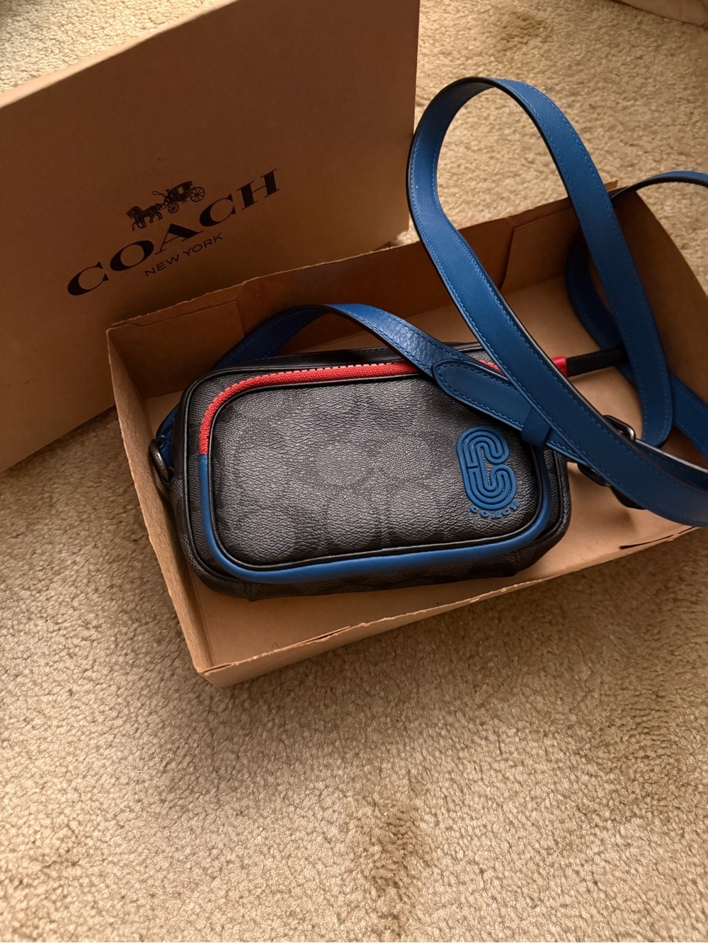 Coach Black Monogram Crossbody with Blue Strap and Red Trim
